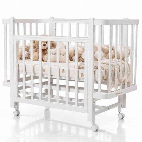 Кроватка Indigo Bella продольный маятник на колесах 120х60 см 4