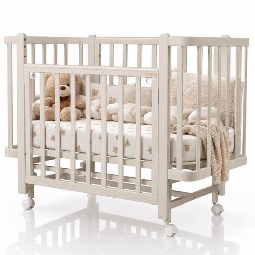 Кроватка Indigo Bella продольный маятник на колесах 120х60 см
