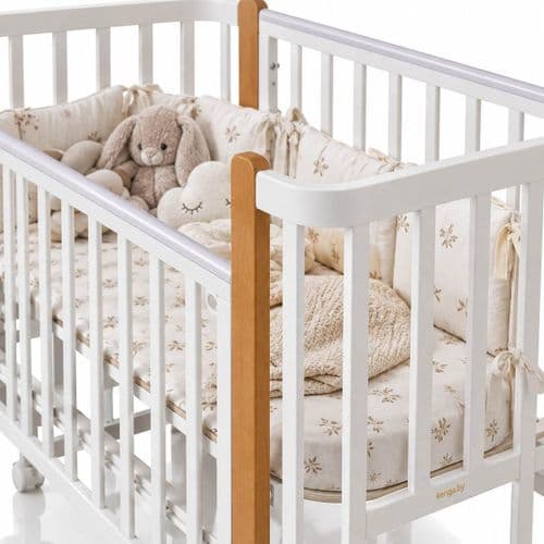 Кроватка Indigo Bella продольный маятник на колесах 120х60 см 3